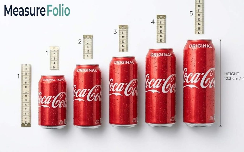 Five Coca-Cola cans of increasing heights shown with numbered measuring guides.
